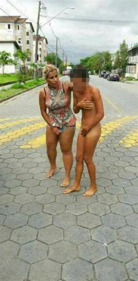 Furious Wife Frogmarches Love Rival NAKED Through Streets After Catching Her In Bed With Husband