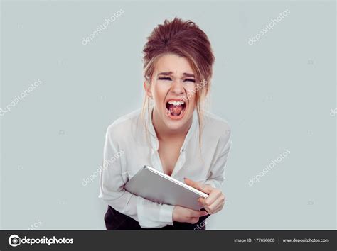 Screaming. Closeup portrait frustrated unhappy young business woman ...