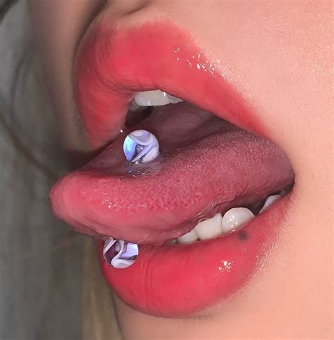 Pin by 𝕷𝖎𝖑𝖎𝖙𝖍 on 𝓟𝓲𝓮𝓻𝓬𝓲𝓷𝓰𝓼 in Tongue piercing jewelry Cool piercings