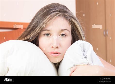 Tired Young Woman In Bed Stock Photo Alamy
