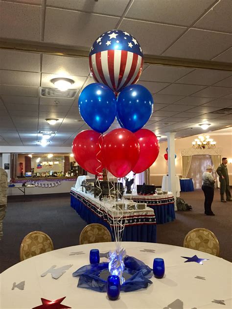 Several Balloons Are On Top Of Each Other In The Middle Of A Banquet