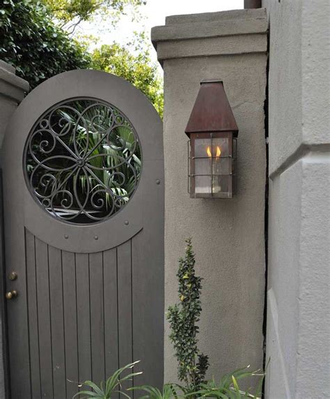 Metal garden gates are superb value for money as they provide several benefits to the homeowner including aesthetic appeal, security, privacy and restricted access. Love the metal scrollwork in this round gate window! Decorative gates are a beautiful way to ...