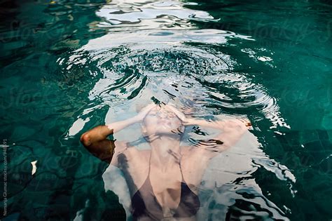 Tanned Caucasian Woman Underwater By Nemanja Glumac Woman Swimming Pool Stocksy United