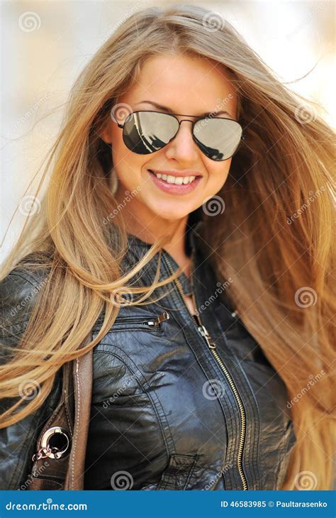 Fashion Portrait Of Beautiful Smiling Woman Wearing Sunglasses Stock