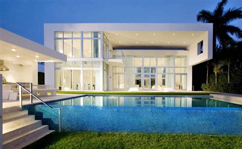 Small modern glass house with pool. 20 Luxurious Backyard Infinity Pool Designs