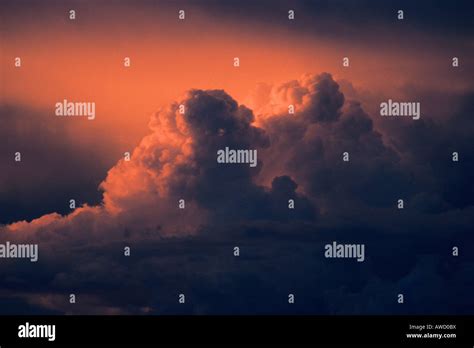 Sunset Lights On Storm Cloud Stock Photo Alamy