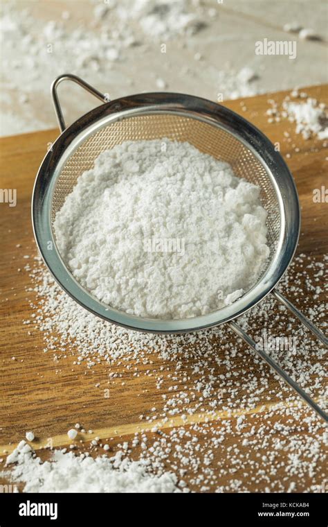 Sweet Organaic Confectioners Powdered Sugar In A Sieve Stock Photo Alamy