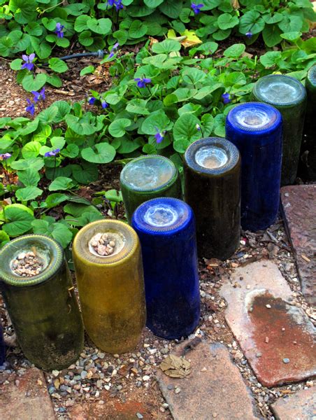 ideas    enhance  garden  glass bottles page