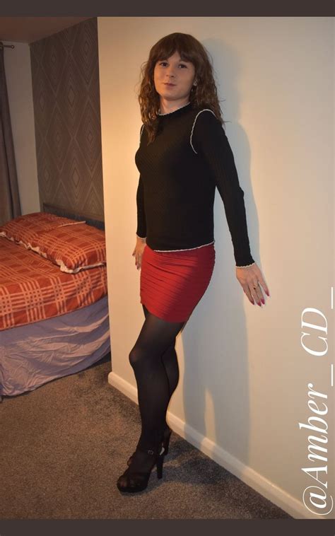 transgender girls red outfit tgirls shemale wearing black crossdressers leather skirt