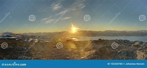 Hdr Panorama Of Midnight Sun Seen From The Peak Of Nuolja In Northern