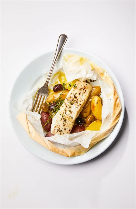 In a small bowl, combine the soy sauce, vinegar, oil, and ginger. Parchment-Baked Halibut with Thyme and Olives | Recipe in ...