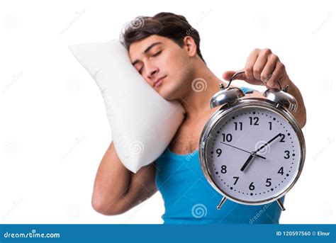 The Man Waking Up With Alarm Clock Isolated On White Stock Photo