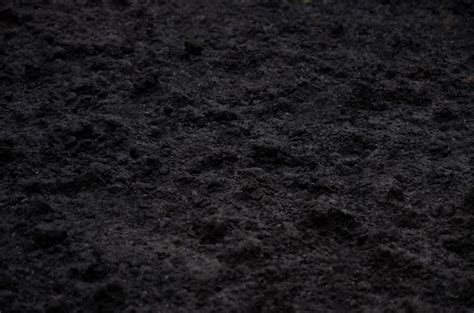 Premium Photo Dark Black Soil Texture