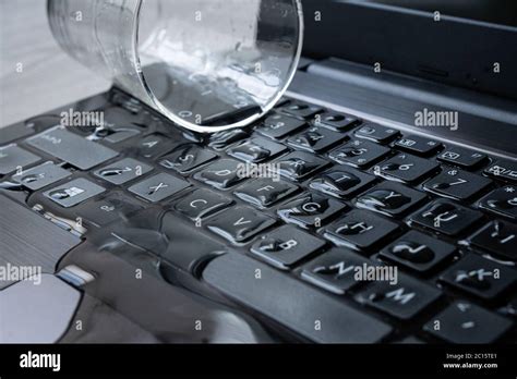 Laptop Computer Water Spill Ruined Keyboard Destroyed Accident