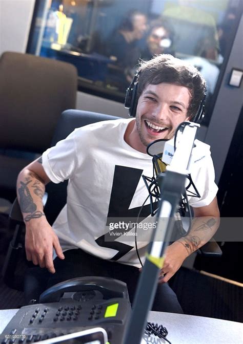 Singer Louis Tomlinson Visits The Launch Of Hits 1 In Hollywood On