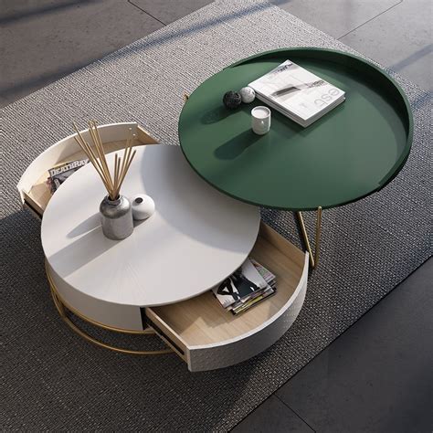 Let's use one of useful coffee table for your home, especially your living room. Round Nesting Coffee Table with Storage Rotatable Drawers ...