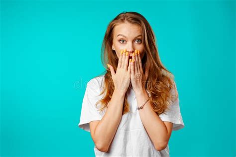 Shocked And Amazed Young Woman With Funny Face Expression Stock Image