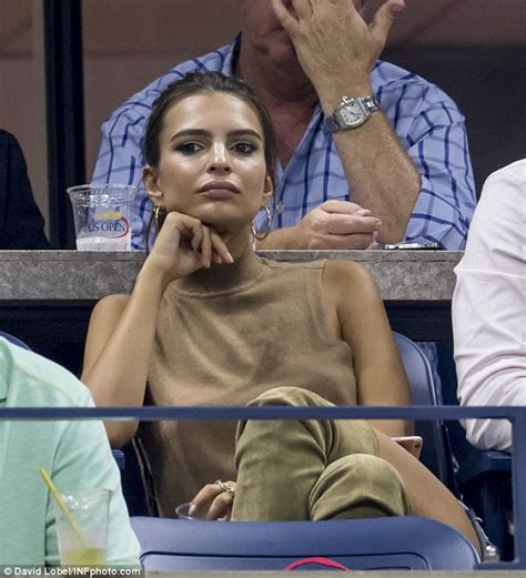 Emily Ratajkowski Shows Off Pert Derriere As She Sits In The Stands At