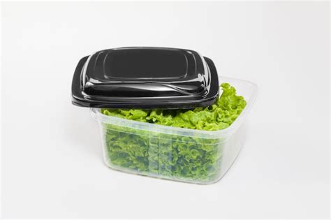 Premium Photo Fresh Lettuce Salad In Plastic Container