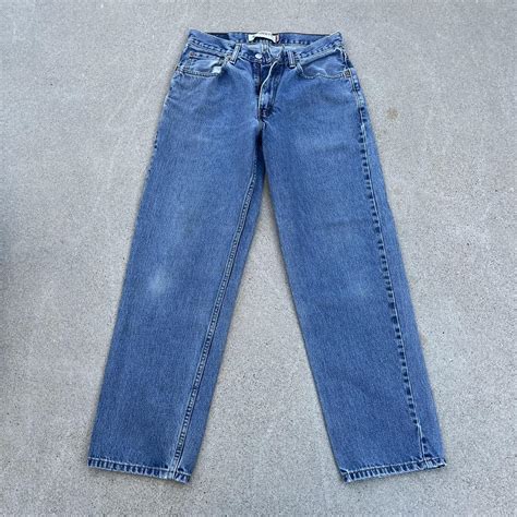 Vintage Levis 550 Light Blue Wash Distressed Jeans Depop