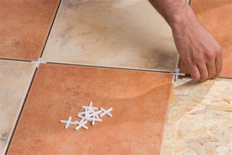 This ensures that all of the tile you install above that board will be straight. Laying a Ceramic Tile Floor | HomeTips
