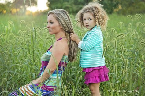 every mom needs a photo of their daughter playing with their hair it s her favor… mother