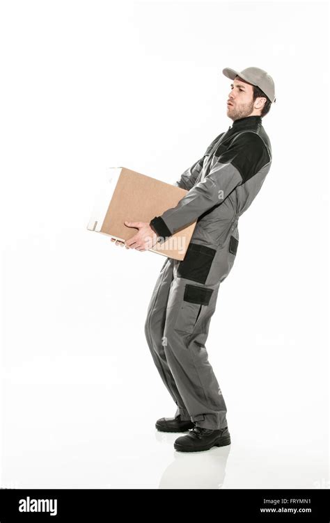 Carrying Heavy Boxes Stock Photos And Carrying Heavy Boxes Stock Images
