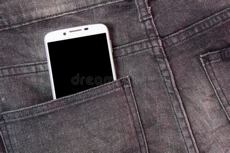 Mobile Phone In Pocket Jeans With Black Screen Jeans Background Stock