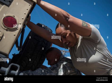 Master Sgt Brandi Love United States Air Force Weapons School First Sergeant Pushes A Humvee