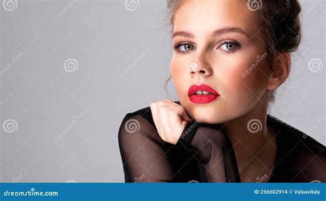 Beautiful Photoshopped Brown Hair Girl Attractive Girl With Bright Makeup Looking At The Camera