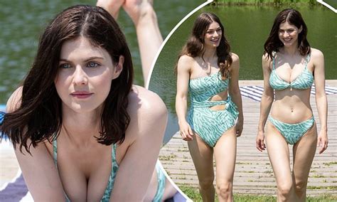 Alexandra Daddario Puts On A Busty Display As She Sports Matching Swimsuits With Sister