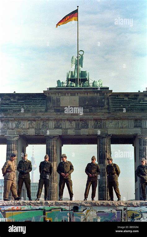 Nva Soldiers On The Berlin Wall In 1989 Berlin Germany Stock Photo
