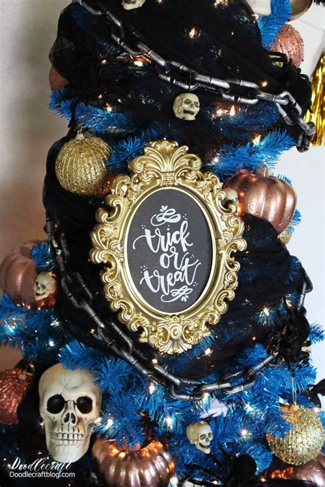 Diy Halloween Tree Ornaments With Crow Topper On Blue Tree Halloween