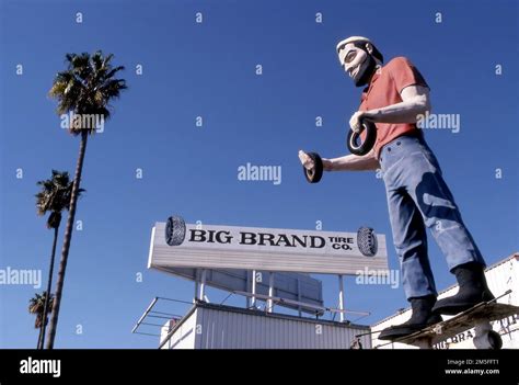 Tire Giant advertising figure at Big Brand Tires in the San Fernando