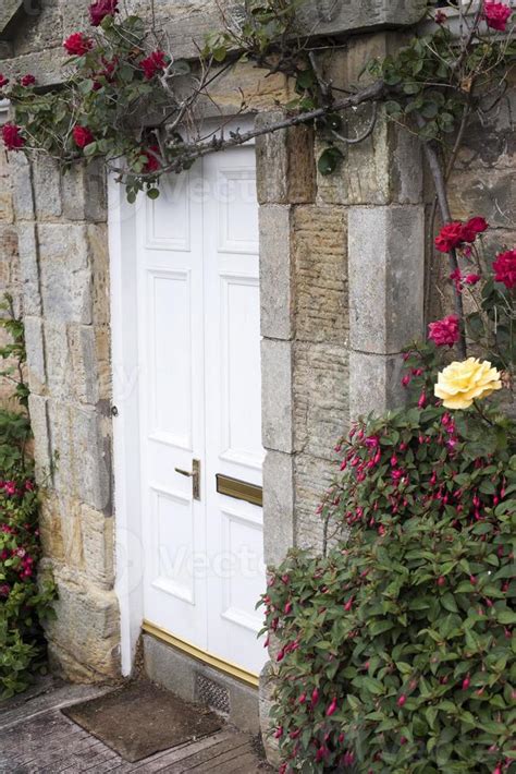 Roses Growing Around Stone Block Cottage Door 11951843 Stock Photo At