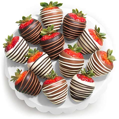 Pouring melted chocolate over cherry, strawberry & cream. Best Chocolate Covered Strawberry Flavors - July 2020 ...