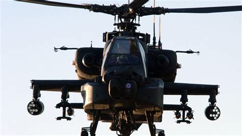 I saw chinook, blackhawk, and apache helicopters sprawled across the airfield, many of which were on the ground and being worked on, while a few periodically hovered above. Apache Helicopter Wallpapers - Wallpaper Cave