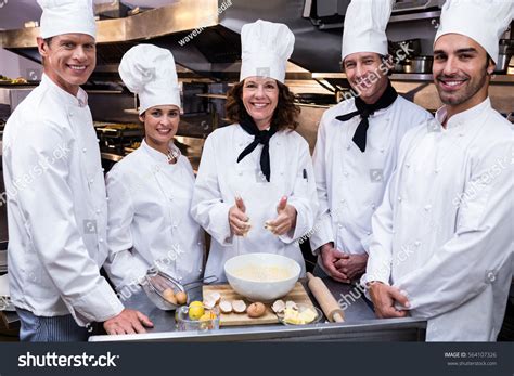 Portrait Happy Chefs Team Standing Together Stock Photo 564107326