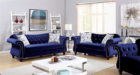 Sofas serves a special purpose too in living rooms, it changes the total look of your contemporary living room. Jolanda Tufted Blue Fabric Sofa Set