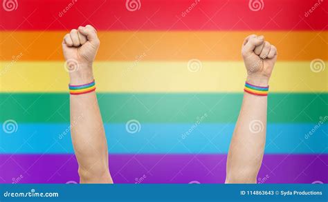 Hands With Gay Pride Rainbow Wristbands Shows Fist Stock Image Image Of Adult Gesture 114863643