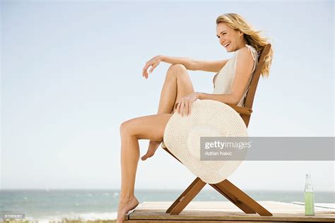 Girl On Beach Chair Photo Getty Images