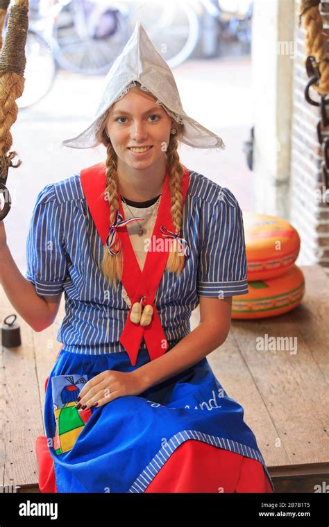 Cute Blonde Teen In Traditional Dutch Clothing At The Goudse Waag In Gouda South Holland
