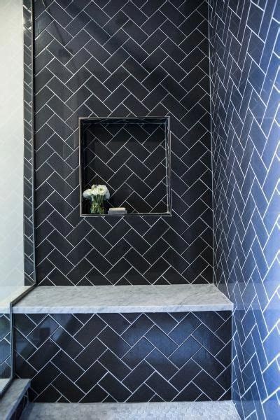 Contemporary Shower Features Navy Herringbone Tiles Accented With A Navy Tiled Niche Over A