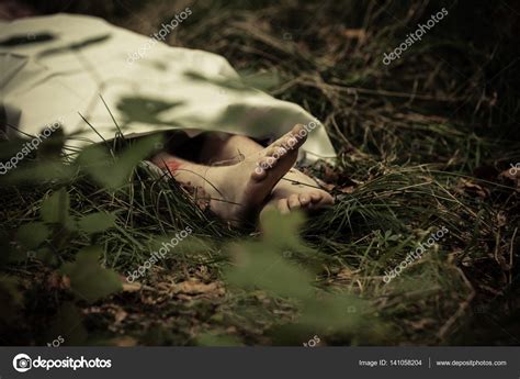 Lower Body Of Abandoned Murder Victim Stock Photo By ©jhandersen 141058204