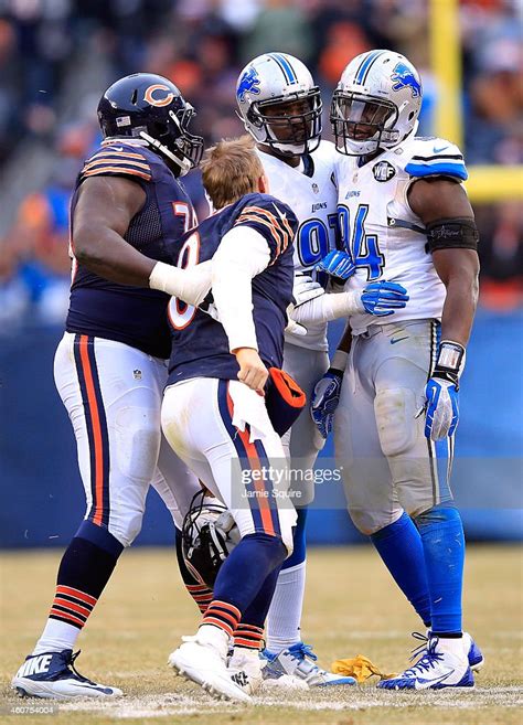 Quarterback Jimmy Clausen Of The Chicago Bears Is Restrained By News Photo Getty Images
