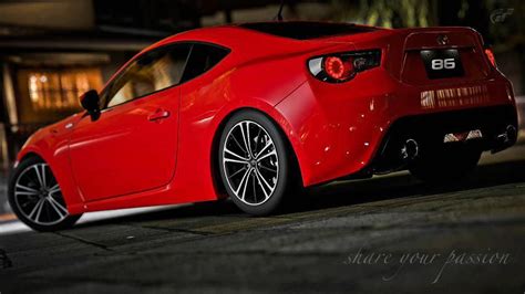 Rear View Or A Lowered Red Toyota 86 With Tinted Tail Lights Tuner