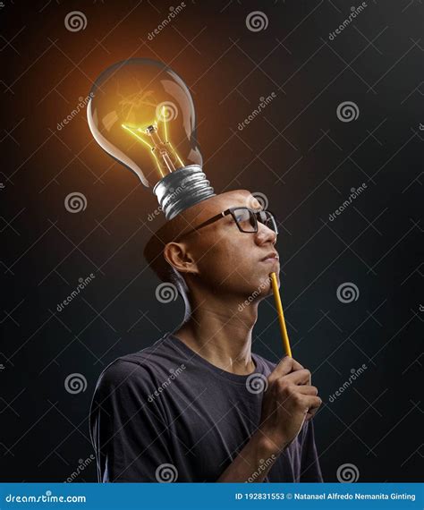 Creative Brain Thinking Glowing Bulb Inside Man`s Head Stock Image