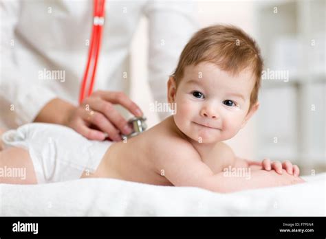 Baby Health Care Doctor Examining Child Stock Photo Alamy