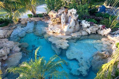 Natural Lagoon Swimming Pool With Sand Bottom And Waterfalls