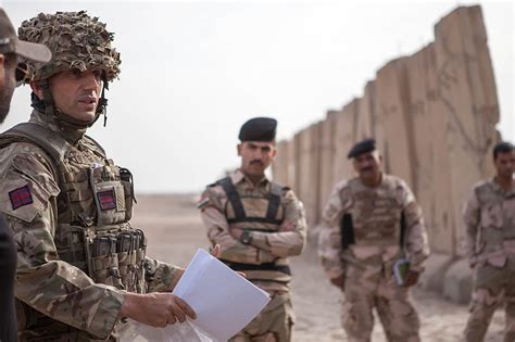 British Army Reme Officer Training Iraqi Soldiers Holding Papers Uk